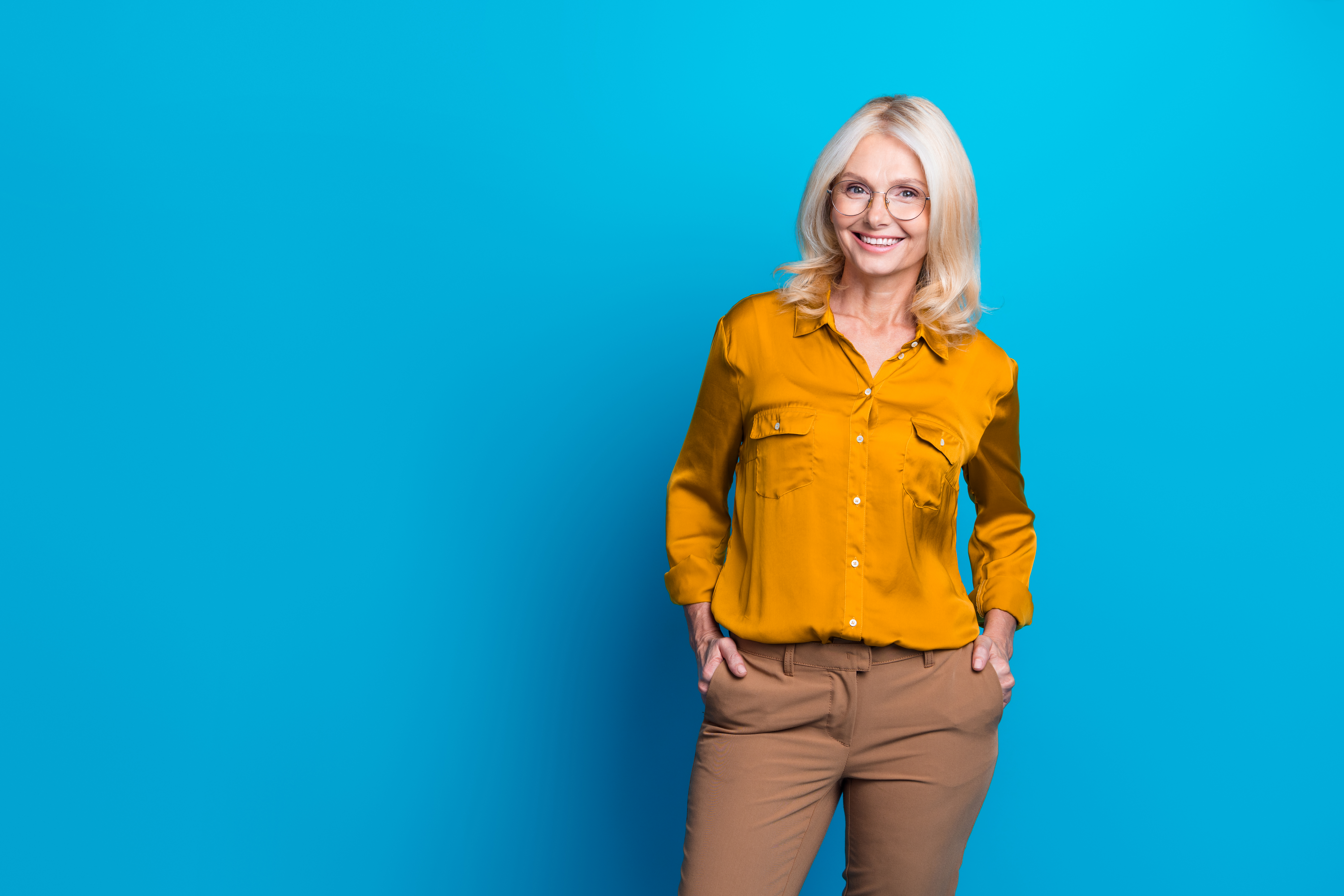 Woman in yellow shirt smiling